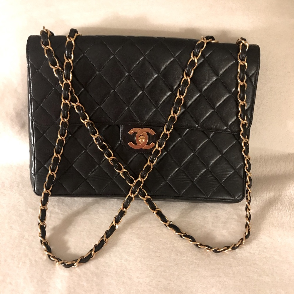 Chanel maxi vintage flap bag in black lamb skin